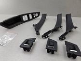 Front door interior handle trim