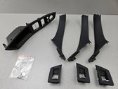 Front door interior handle trim