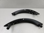 Front door interior handle trim
