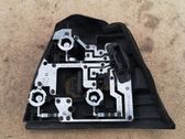 Tail light bulb cover holder