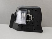 Tail light bulb cover holder