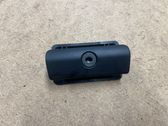 Glove box opening button