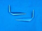 Rear bumper trim bar molding
