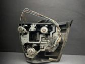 Tail light bulb cover holder