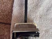 Front door check strap stopper