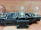 Tail light bulb cover holder