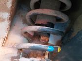 Front shock absorber with coil spring