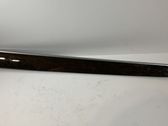 Front door trim bar