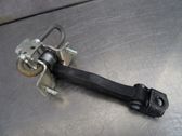 Front door check strap stopper