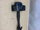 Front door check strap stopper