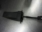 Front door check strap stopper