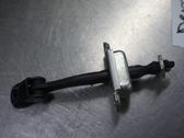 Front door check strap stopper