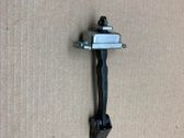 Front door check strap stopper