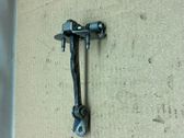Front door check strap stopper
