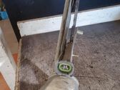Regulador de puerta delantera con motor