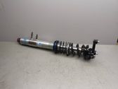 Front shock absorber with coil spring