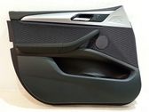 Front door card panel trim
