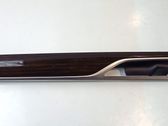 Front door trim bar