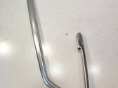 Front door trim bar