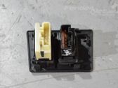 Bouton interrupteur de trappe à essence