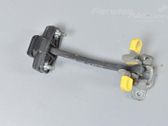 Loading door check strap stopper