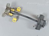 Loading door check strap stopper