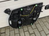 Rear door window regulator with motor
