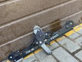 Rear door window regulator with motor