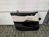 Front door card panel trim
