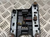 Tail light bulb cover holder