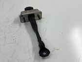Rear door check strap stopper