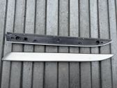Autres éléments de garniture porte avant