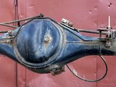 Rear axle beam with reductor