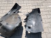 Front wheel arch liner splash guards