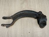 Lower shock absorber bracket