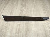Front door trim bar