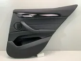 Coupe rear side trim panel