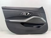Front door card panel trim