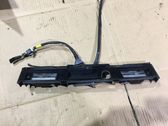 Trunk door license plate light bar