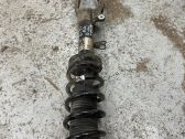 Front shock absorber with coil spring