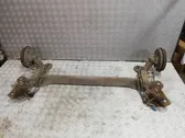 Rear axle beam with reductor