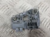 Tail light bulb cover holder