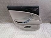 Moldura del tarjetero de la puerta trasera