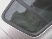 Ventanilla de ventilación de la puerta trasera