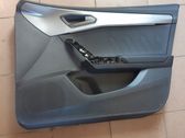 Front door card panel trim