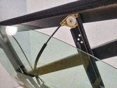 Regulador de puerta delantera con motor