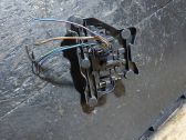 Tail light bulb cover holder