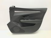 Front door card panel trim