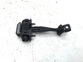 Front door check strap stopper
