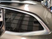 Ventanilla de ventilación de la puerta trasera
